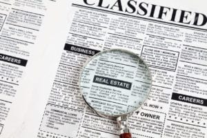 real estate classifieds section of newspaper