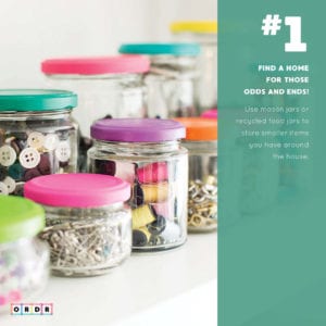 Clear jars filled with random items.