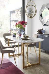 Sitting area with a brass table.
