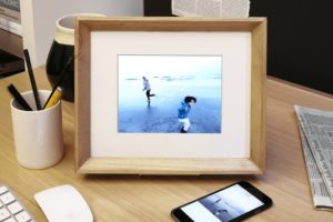 Digital picture frame on a desk