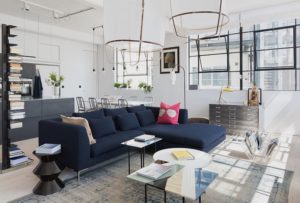 Blue Scandinavian couch in modern apartment