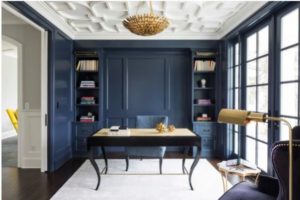 Home office with dark blue walls
