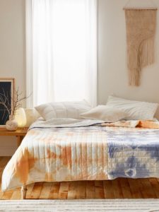 Bed with tie-dye bed spread