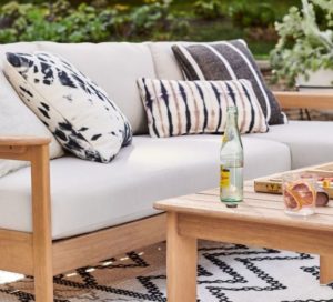 Outdoor couch with tie-dye throw pillows