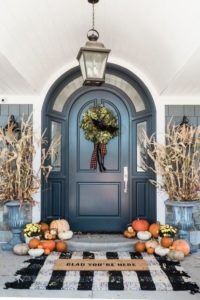 Front outdoor entryway decorated for Fall