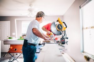 Men completing DIY renovation at home